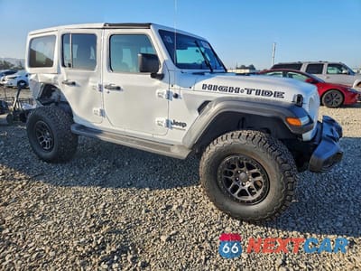 Czwarte zdjęcie samochodu z boku: 2022 JEEP WRANGLER UNLIMITED SPORT VIN:1C4HJXDG8NW226033 - miniatura