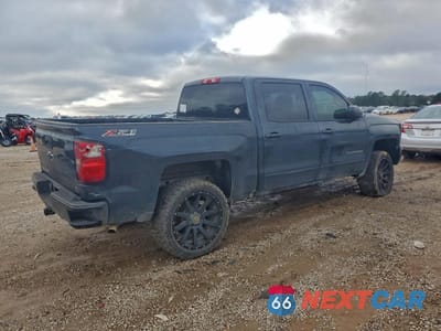 Trzecie zdjęcie samochodu z tyłu: 2017 CHEVROLET SILVERADO K1500 4WD 2LT VIN:3GCUKREC2HG504057 - miniatura