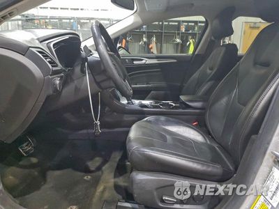 Zdjęcie 7 z 11 samochodu: 2016 FORD FUSION TITANIUM HEV VIN:3FA6P0RUXGR357732 - miniatura