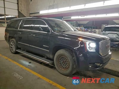 Czwarte zdjęcie samochodu z boku: 2016 GMC YUKON XL DENALI VIN:1GKS2HKJ3GR122885 - miniatura