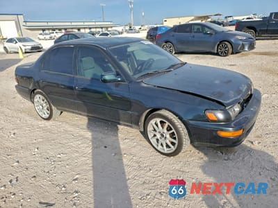 Czwarte zdjęcie samochodu z boku: 1996 TOYOTA COROLLA DX VIN:1NXBB02E5TZ463496 - miniatura