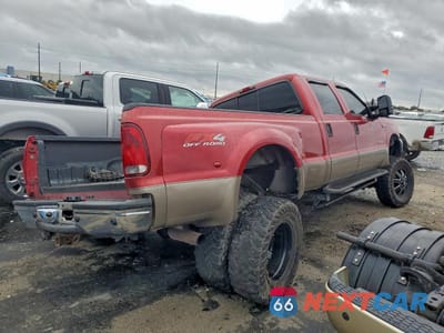 Trzecie zdjęcie samochodu z tyłu: 2003 FORD F350 SUPER DUTY VIN:1FTWW33P93EC52985 - miniatura