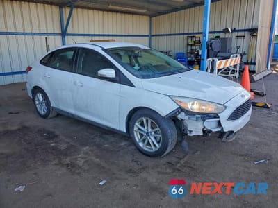 Czwarte zdjęcie samochodu z boku: 2016 FORD FOCUS SE VIN:1FADP3F22GL391545 - miniatura