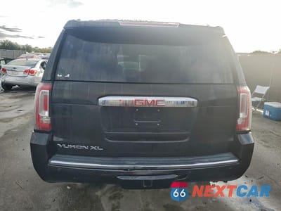 Zdjęcie 6 z 12 samochodu: 2019 GMC YUKON XL DENALI VIN:1GKS1HKJ1KR380317 - miniatura