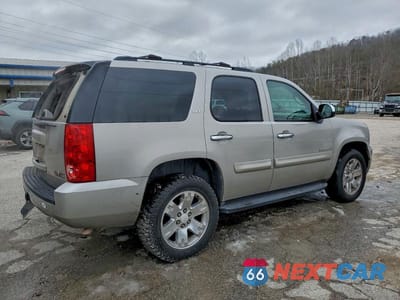 Trzecie zdjęcie samochodu z tyłu: 2007 GMC YUKON VIN:1GKFK13087J349681 - miniatura