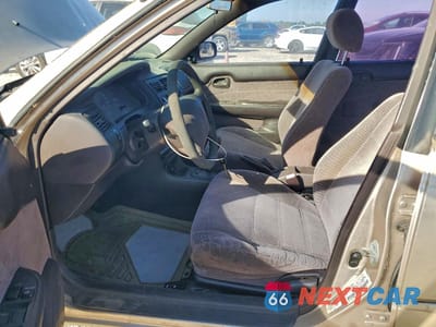 Zdjęcie 7 z 12 samochodu: 1995 TOYOTA COROLLA LE VIN:1NXAE09B0SZ305337 - miniatura