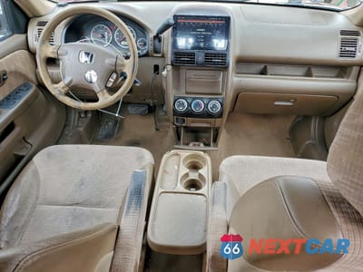 Zdjęcie 8 z 13 samochodu: 2003 HONDA CR-V LX VIN:JHLRD78453C029575 - miniatura