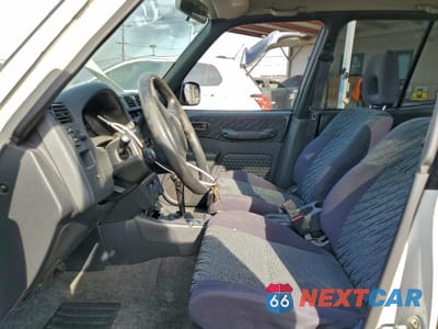 Zdjęcie 7 z 15 samochodu: 2000 TOYOTA RAV4 VIN:JT3GP10VXY0050481 - miniatura