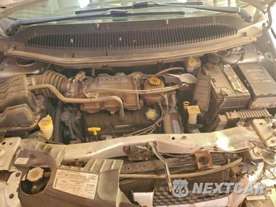 Zdjęcie 12 z 13 samochodu: 2003 DODGE GRAND CARAVAN SE VIN:1D4GP24343B251979 - miniatura