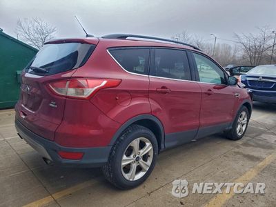 Trzecie zdjęcie samochodu z tyłu: 2016 FORD ESCAPE SE VIN:1FMCU9GX6GUA19420 - miniatura