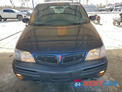 Piąte zdjęcie samochodu w środku: 2002 PONTIAC MONTANA LUXURY VIN:1GMDX13E72D215537 - miniatura