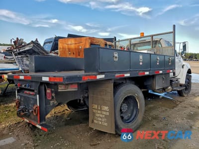 Czwarte zdjęcie samochodu z boku: 2015 FORD F750 SUPER DUTY VIN:3FRXF7FC1FV727092 - miniatura