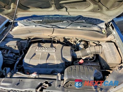 Zdjęcie 11 z 12 samochodu: 2006 HONDA RIDGELINE RTS VIN:2HJYK16486H502008 - miniatura