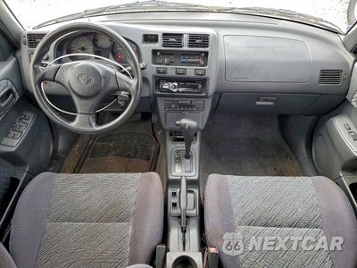 Zdjęcie 8 z 12 samochodu: 1999 TOYOTA RAV4 VIN:JT3GP10V5X7058235 - miniatura
