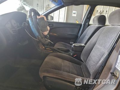 Zdjęcie 7 z 13 samochodu: 1999 NISSAN MAXIMA GLE VIN:JN1CA21D0XT207409 - miniatura