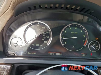 Zdjęcie 9 z 14 samochodu: 2011 BMW 750 LXI VIN:WBAKC8C59BC433367 - miniatura