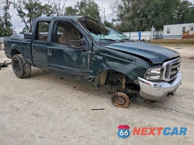 Czwarte zdjęcie samochodu z boku: 2002 FORD F250 SUPER DUTY VIN:1FTNW21F02EB76829 - miniatura