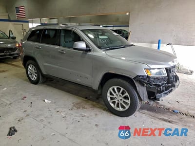 Czwarte zdjęcie samochodu z boku: 2015 JEEP GRAND CHEROKEE LAREDO VIN:1C4RJEAG1FC721772 - miniatura