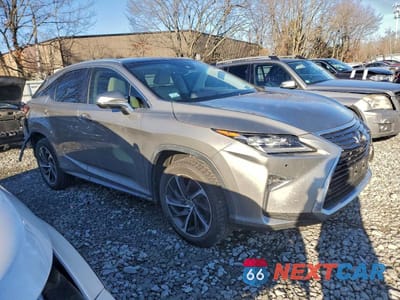 Czwarte zdjęcie samochodu z boku: 2017 LEXUS RX 450H BASE VIN:2T2BGMCA4HC018000 - miniatura