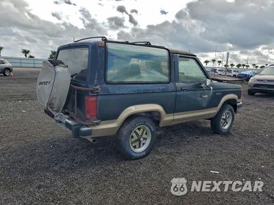 Trzecie zdjęcie samochodu z tyłu: 1989 FORD BRONCO II VIN:1FMCU14T0KUB39127 - miniatura