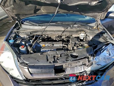 Zdjęcie 12 z 12 samochodu: 2009 HONDA CR-V LX VIN:5J6RE48339L021400 - miniatura
