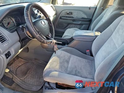 Zdjęcie 7 z 14 samochodu: 2004 HONDA PILOT EX VIN:2HKYF18474H591337 - miniatura