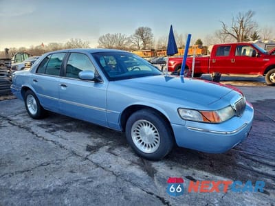 Czwarte zdjęcie samochodu z boku: 2000 MERCURY GRAND MARQUIS LS VIN:2MEFM75W1YX666235 - miniatura