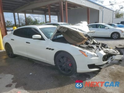 Czwarte zdjęcie samochodu z boku: 2014 MASERATI QUATTROPORTE S VIN:ZAM56RRA8E1077734 - miniatura