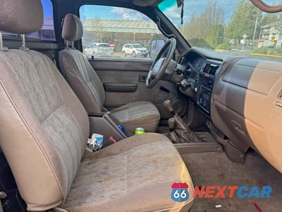 Piąte zdjęcie samochodu w środku: 1999 TOYOTA TACOMA VIN:4TAPM62N5XZ472792 - miniatura