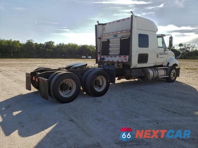 Czwarte zdjęcie samochodu z boku: 2012 INTERNATIONAL PROSTAR SEMI TRUCK VIN:3HSDJSJR6CN619941 - miniatura