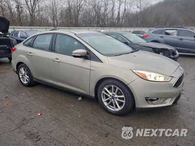 Czwarte zdjęcie samochodu z boku: 2016 FORD FOCUS SE VIN:1FADP3F23GL251021 - miniatura