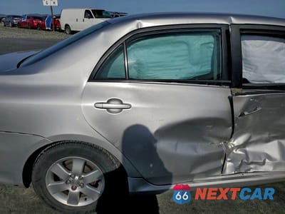 Zdjęcie 10 z 13 samochodu: 2011 TOYOTA COROLLA BASE VIN:JTDBU4EE4B9142682 - miniatura