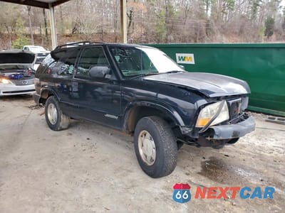 Czwarte zdjęcie samochodu z boku: 2001 GMC JIMMY VIN:1GKCS18W31K172328 - miniatura