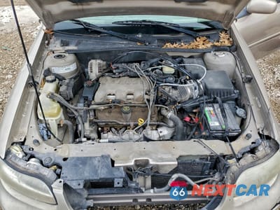 Zdjęcie 11 z 12 samochodu: 2000 CHEVROLET MALIBU LS VIN:1G1NE52JXY6153027 - miniatura