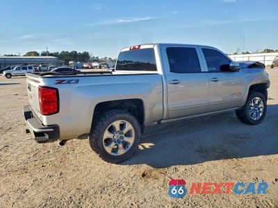 Trzecie zdjęcie samochodu z tyłu: 2018 CHEVROLET SILVERADO K1500 LT VIN:3GCUKREC1JG514620 - miniatura