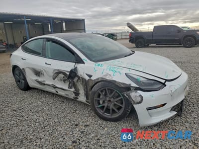 Czwarte zdjęcie samochodu z boku: 2023 TESLA MODEL 3 VIN:5YJ3E1EAXPF481568 - miniatura
