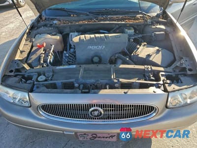 Zdjęcie 11 z 12 samochodu: 2000 BUICK LESABRE CUSTOM VIN:1G4HP54K9Y4289323 - miniatura