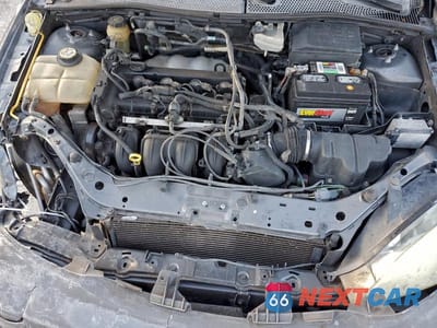 Zdjęcie 11 z 12 samochodu: 2005 FORD FOCUS ZX3 VIN:3FAFP31N65R144070 - miniatura