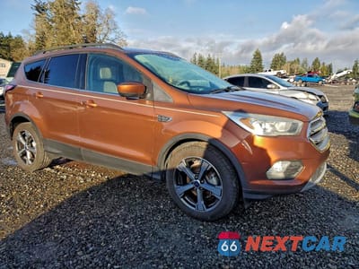 Czwarte zdjęcie samochodu z boku: 2017 FORD ESCAPE SE VIN:1FMCU0GD1HUA19652 - miniatura