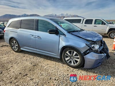 Czwarte zdjęcie samochodu z boku: 2014 HONDA ODYSSEY TOURING VIN:5FNRL5H99EB084956 - miniatura
