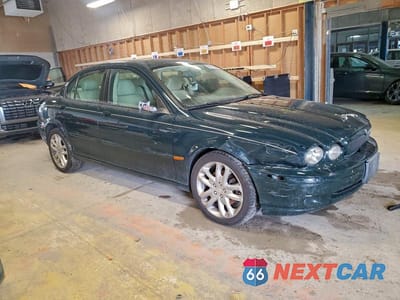 Czwarte zdjęcie samochodu z boku: 2004 JAGUAR X-TYPE 3.0 VIN:SAJEA51C64WD99741 - miniatura