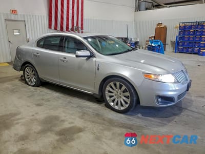 Czwarte zdjęcie samochodu z boku: 2012 LINCOLN MKS VIN:1LNHL9DRXCG803512 - miniatura