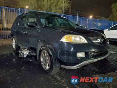 Czwarte zdjęcie samochodu z boku: 2004 ACURA MDX TOURING VIN:2HNYD18614H521410 - miniatura