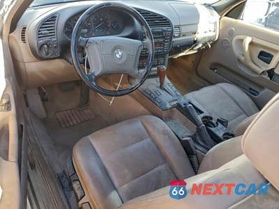 Zdjęcie 8 z 11 samochodu: 1998 BMW 323 IC AUTOMATIC VIN:WBABJ8321WEM21364 - miniatura
