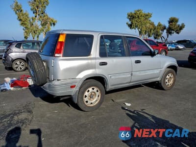 Trzecie zdjęcie samochodu z tyłu: 1999 HONDA CR-V LX VIN:JHLRD1847XC063777 - miniatura