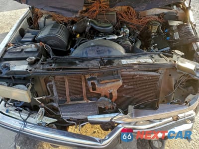 Zdjęcie 12 z 14 samochodu: 1999 CHEVROLET TAHOE K1500 VIN:1GNEK13RXXJ436396 - miniatura