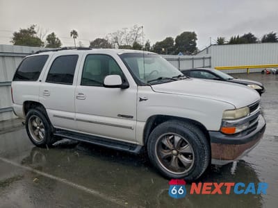 Czwarte zdjęcie samochodu z boku: 2012 CHEVROLET TAHOE C1500 VIN:1GNEC13Z92R235094 - miniatura