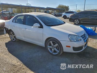 Czwarte zdjęcie samochodu z boku: 2010 VOLKSWAGEN JETTA SE VIN:3VWRZ7AJ9AM145868 - miniatura