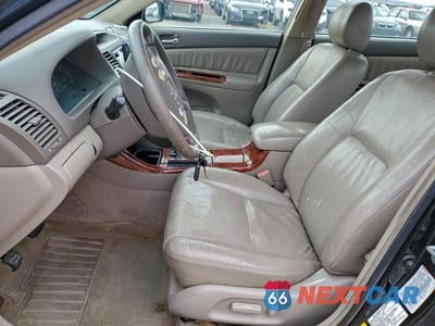 Zdjęcie 7 z 11 samochodu: 2003 TOYOTA CAMRY XLE V6 VIN:JTDBF30K830094269 - miniatura