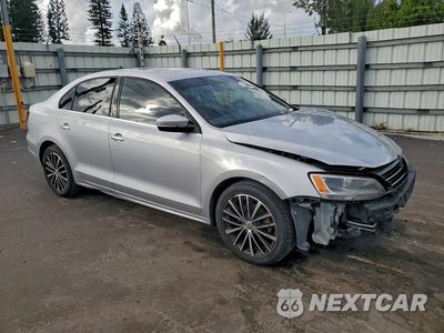 Czwarte zdjęcie samochodu z boku: 2016 VOLKSWAGEN JETTA SE VIN:3VWD67AJXGM361255 - miniatura